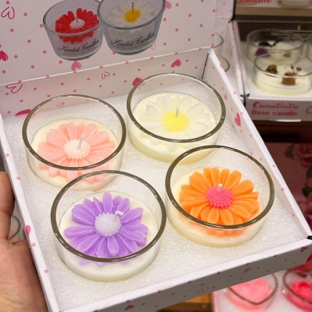 شموع ديكور معطرة على شكل وردة داخل كأس زجاجي