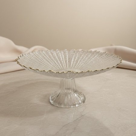 صحن تقديم زجاجي بحواف ذهبية