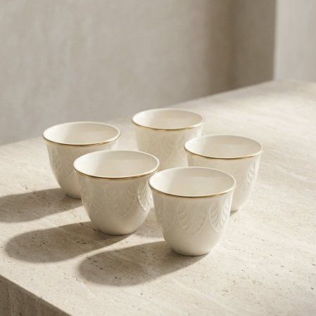 طقم فناجين قهوة بورسلان ابيض مع نقوش بارزة وحافة ذهبية