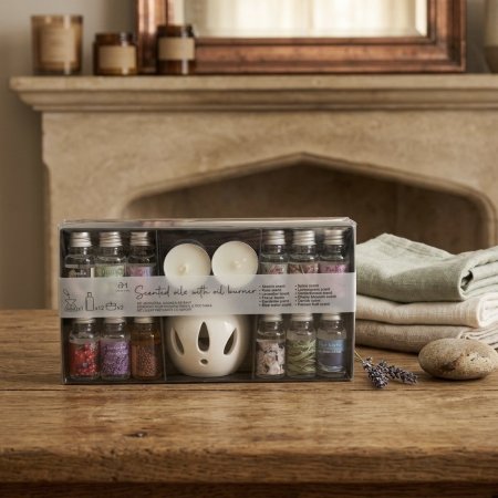 طقم مبخرة سيراميك مع ١٢ زيت عطري وشمعتين