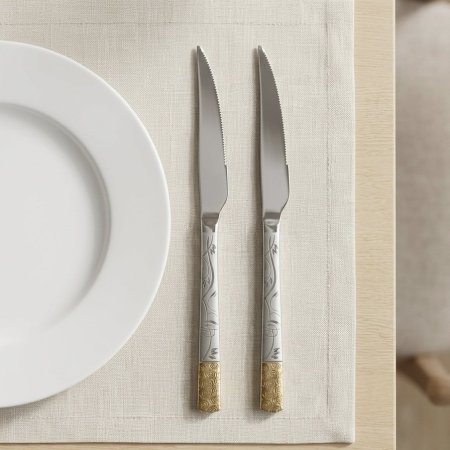 طقم سكاكين سفرة ستانلس ستيل بتصميم يجمع بين اللونين الفضي والذهبي 6 قطع