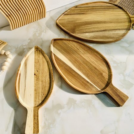 صواني خشبية على شكل أوراق الشجر