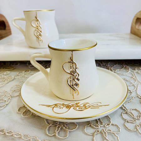 طقم ٦ فناجين قهوة بورسلان ابيض بتصميم خط عربي مزخرف
